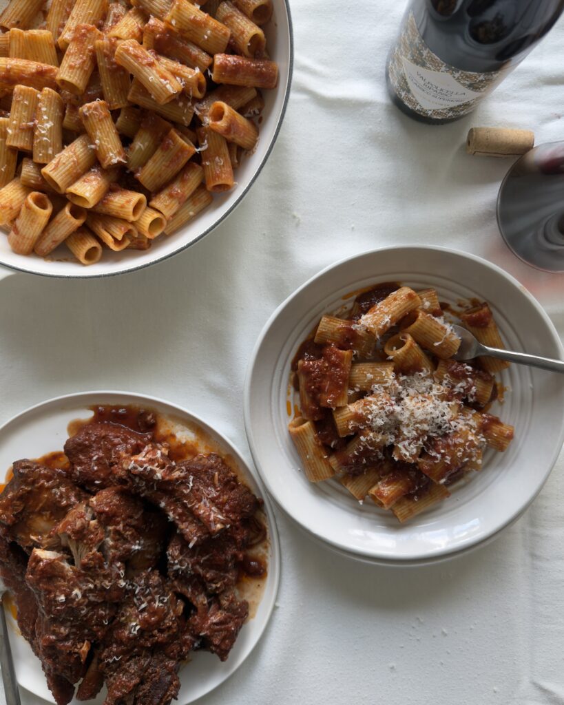 Italian Sunday sauce with braised bone-in short ribs and country-style pork ribs served over rigatoni, finished with grated Parmesan cheese