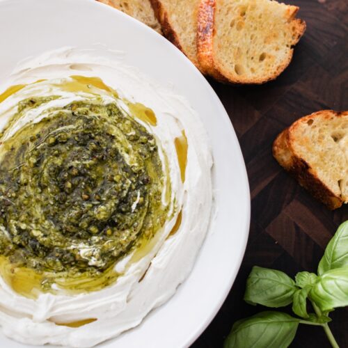 pistachio pesto served as a dip with whipped ricotta and toasted bread