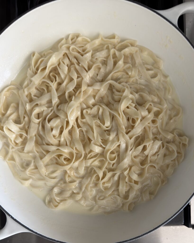 Creamy Parmesan fettuccine Alfredo sauce tossed with bronze-die fettuccine noodles for silky blackened chicken Alfredo pasta.