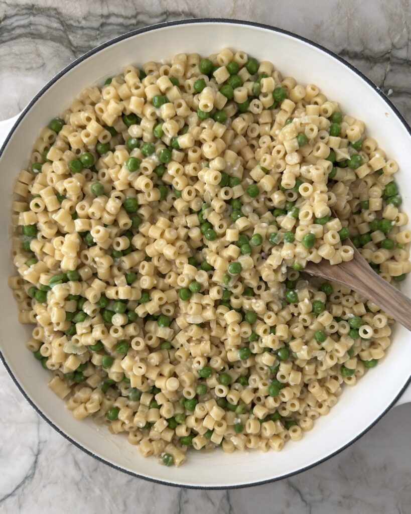 Ditalini pasta and peas stirred with Pecorino Romano and pasta water until creamy for pasta e piselli.